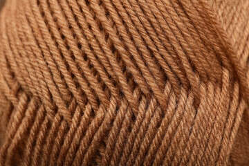 Closeup view of brown knitting yarn as background