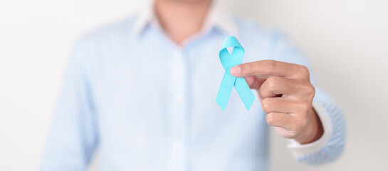 man with blue Ribbon for concept of blue November, November Prostate Cancer Awareness month, World...
