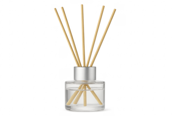 Aromatic diffuser with reed sticks releasing fragrance on transparent background