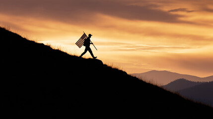 Silhouette of patriotic man with the American flag of the USA at sunrise on top of mountain. Celebrating National Patriot Day, Independence and Flag Day in America