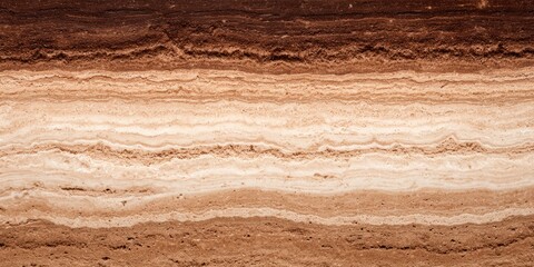 Horizontal layers of varying shades of brown and beige, resembling geological strata