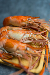 Boiled shrimp river or freshwater prawn in wood plate, ready to eat