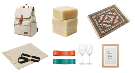 LIFESTYLE - Collection of gift items including backpack, soap bars, decorative rug, bath towel with scissors, colorful ribbons, wine glasses, and picture frame for celebration and presents