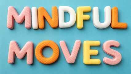 Colorful alphabet cookies spelling out mindful moves on a blue background letters