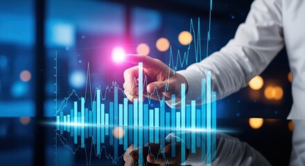 Hand touching a glowing blue digital bar chart representing business data analysis