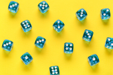 Blue game dices on yellow background