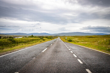 Fototapeta premium road, rannoch moor, glencoe, highlands, scottish highlands, bog, moor, scotland, uk, scenic, panorama, 