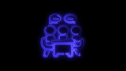 Three people meeting and discussing ideas at a table in neon blue light