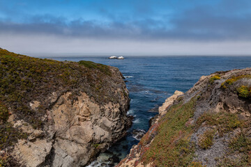 Granitic Rocks, Biotite-hornblende quartz diorite to granodiorite. Soberanes Point Trail, California State Route 1, Monterey County, California.