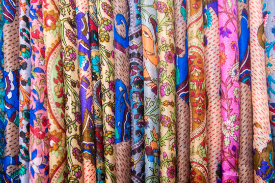 colorful fabric texture of abstract row of silk scarfs in shop in sri lanka