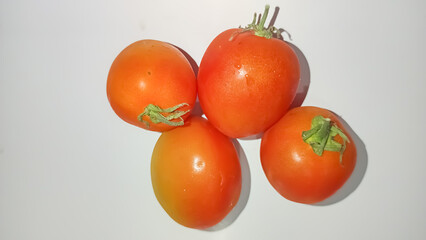 Isolated white of fresh tomatoes