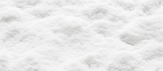 Fototapeta premium Undulating expanse of untouched snow reflecting winter's serene elegance