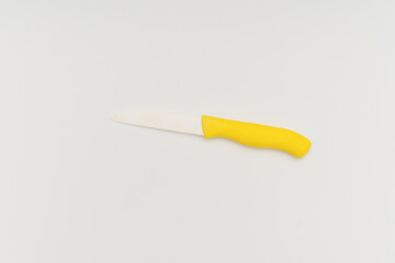 ceramic fruit knife on white background