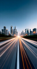 Obraz premium A dynamic cityscape view showcasing a bustling road with streaks of light from fast-moving vehicles and skyscrapers in the background at dusk.
