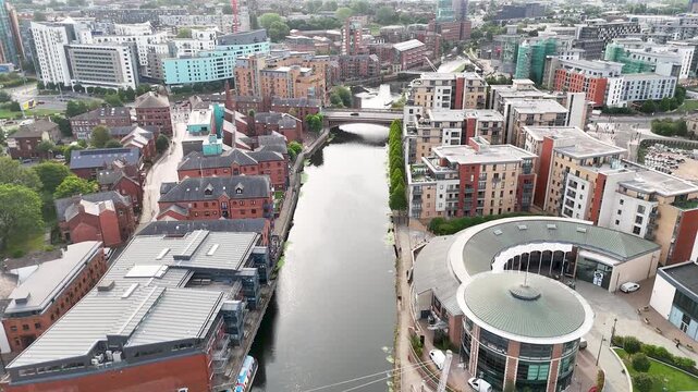 Aerial Flyover of Leeds Cityscape and River Aire