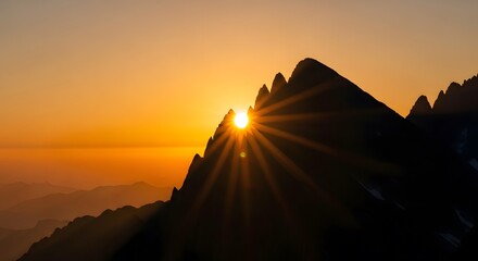 Golden sunrise bursts through jagged mountain peaks, casting long rays across the landscape.