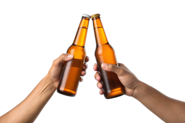 Two hands clinking amber glass beer bottles together in friendship toast with condensation droplets, isolated on a transparent background