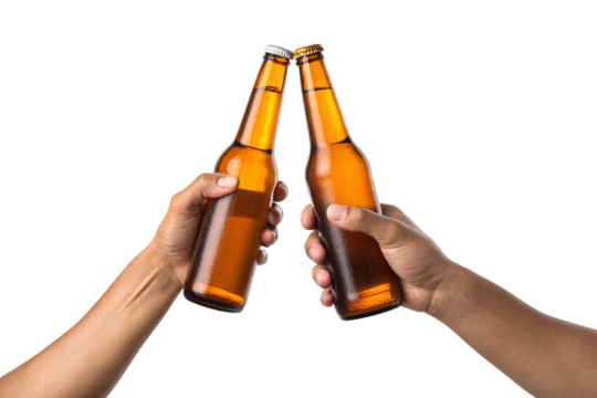 Two hands clinking amber glass beer bottles together in friendship toast with condensation droplets, isolated on a transparent background