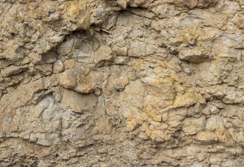 the structure of the rock surface in the section, quarrying in the natural environment, sunny day