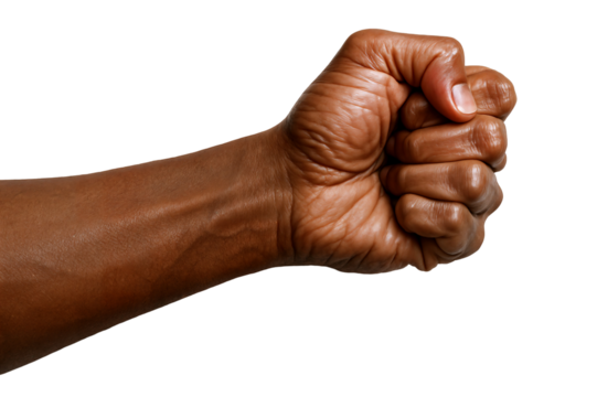 A close-up of a clenched fist of an African descent male highlighting strength and determination.