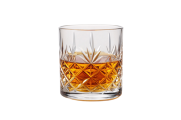 Crystal cut rocks glass containing amber whiskey or bourbon with ornate diamond pattern etched design, isolated on a transparent background