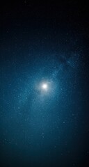 Fototapeta premium A luminous orb dominates a deep teal night sky, speckled with countless distant stars and a hazy galactic swirl