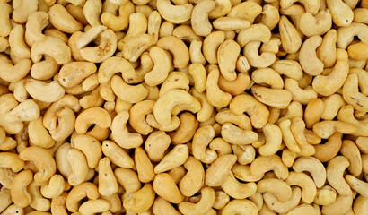 Raw shelled South American cashew nut detail texture background