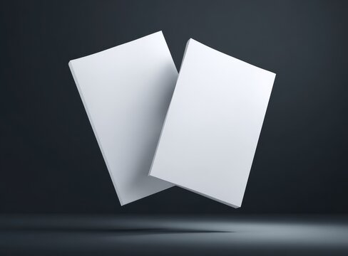 Two blank white books levitate against a dark background