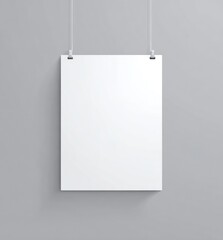 Blank white poster hanging on strings against a muted gray background