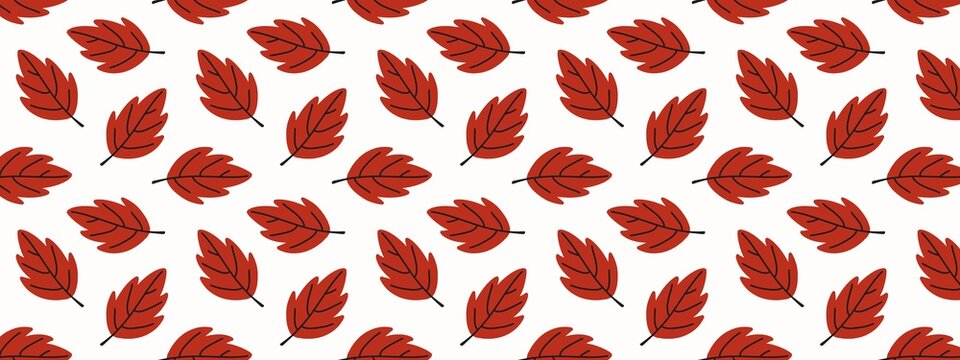 Seamless pattern of red autumn leaves on a white background, perfect for seasonal designs, wallpapers, and fabric prints.