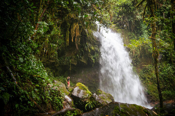 Girl exploring the waterfalls at Boquete Panama