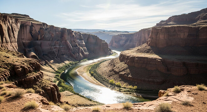 Majestic Canyon Landscape with Winding River and Dramatic Sunlight
