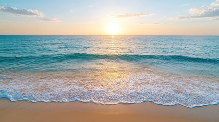 Obraz premium Sunset over calm ocean waves reflecting golden light on sandy beach