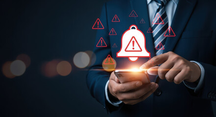 Businessman receives critical alerts and notifications on his mobile device with glowing icons