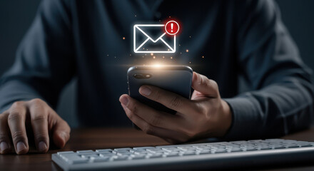 Person receives important email notification on smartphone with glowing alert symbol