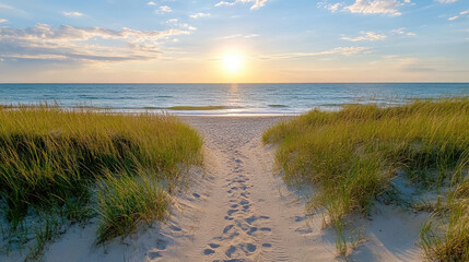 Sunset beach path leading to ocean, surrounded by tall grass and soft sand, evokes tranquility