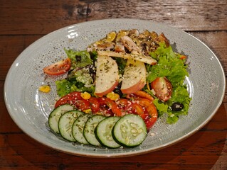 Fresh salad with chicken, apple, tomato