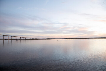 A reflection of Sidney Lanier bridge at sunset