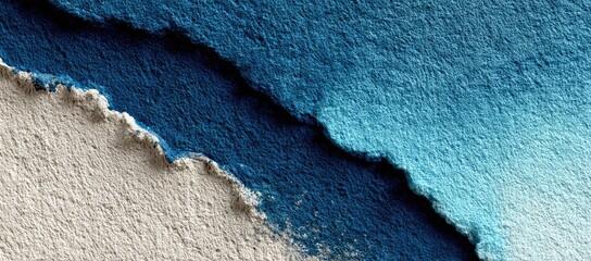 Abstract textured collage of torn paper in shades of blue and beige