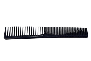 Black plastic comb on transparent background