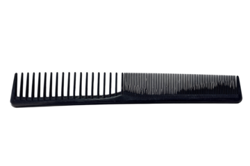 Black plastic comb on transparent background