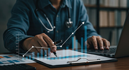 businessman drawing a graph