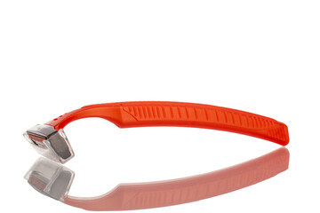 Disposable razor isolated on white background, close-up.