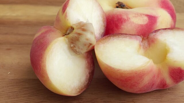 Fresh peaches on a wooden background. Flat peach donut shape