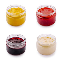 Variety of condiments or sauces displayed in jars, perfect for enhancing meals