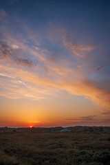 sunrise with glowing clouds