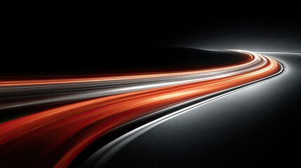 Night road with blurred, vibrant orange light trails