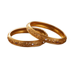 Two ornate golden bangles with intricate detailing and small red gemstones isolated on transparent background