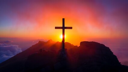 Cross Silhouette on Mountain Peak with Vibrant Sunset Glorious Sky of Orange Purple and Pink Displaying Spiritual Faith Hope and Religious Symbolism