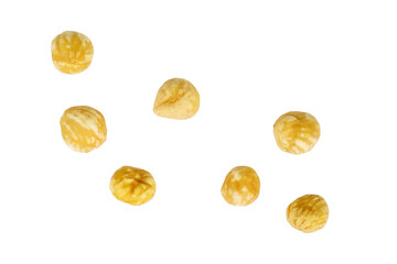 Few roasted and peeled hazelnuts isolated on a white background. Top view